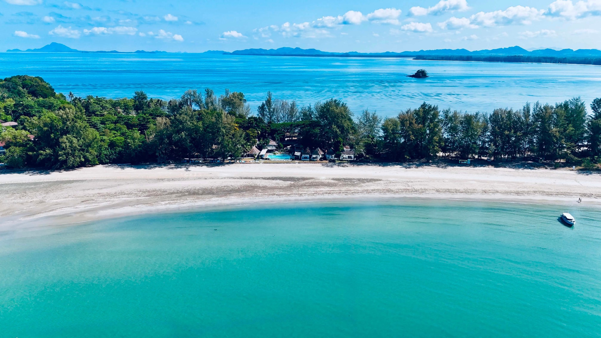 TwinBay Resort seen from the air, set between the beach and the turquoise bay on Koh Lanta